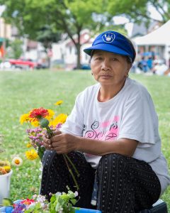 Hmong woman with flowers